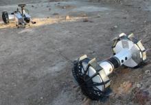 DuAxel rover separates into two single-axled robots