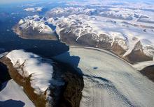 Rink Glacier in western Greenland, with a meltwater lake visible center.
